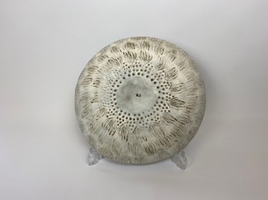 Large Earthenware clay dish, colored in a deep burgundy with contrasting pink textured stripes. 