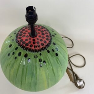 A handmade earthenware lamp base, finished with a variety of different techniques to resemble a watermelon. 